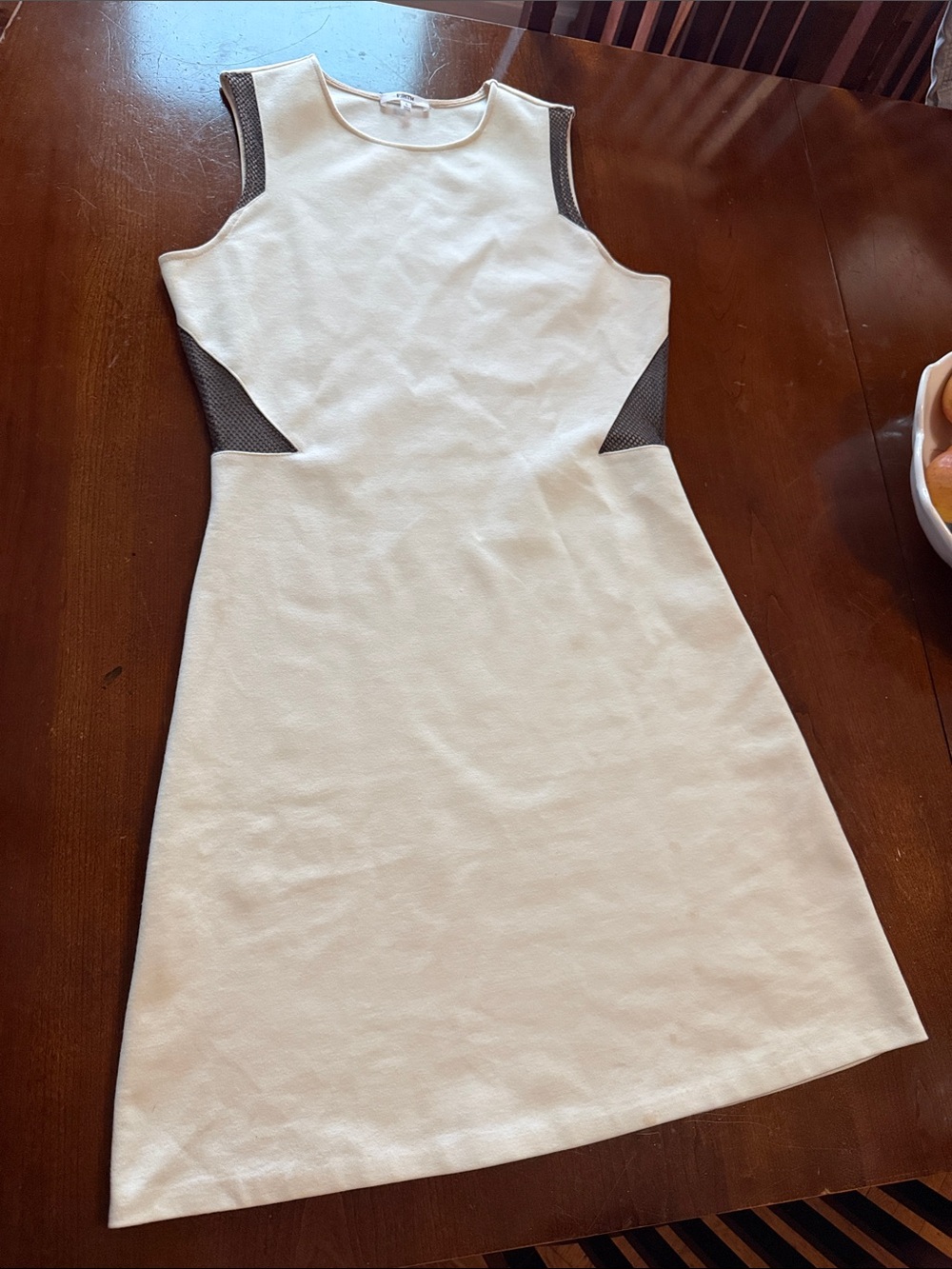 Sleeveless White Mini Dress with Black Mesh Insets
